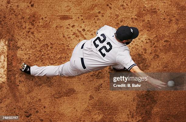 Starting pitcher Roger Clemens of the New York Yankees warms up in the bullpen prior to a game against the Colorado Rockies on June 21, 2007 at Coors...