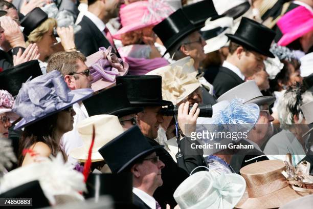 Racegoers watch Royal Ascot Races on Ladies Day on June 21, 2007 in Ascot, England.