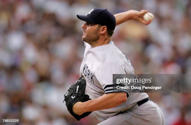 Starting pitcher Roger Clemens of the New York Yankees delivers against the Colorado Rockies and collected the loss as the Rockies defeated the...