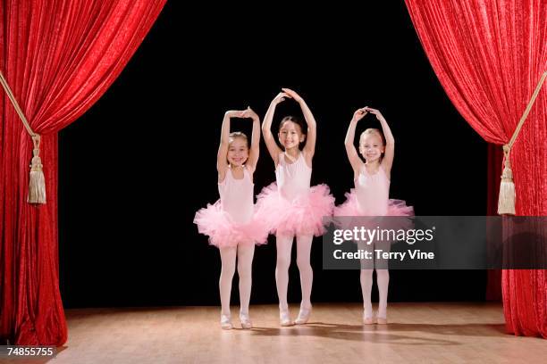 multi-ethnic girls performing ballet recital - children art show stock pictures, royalty-free photos & images