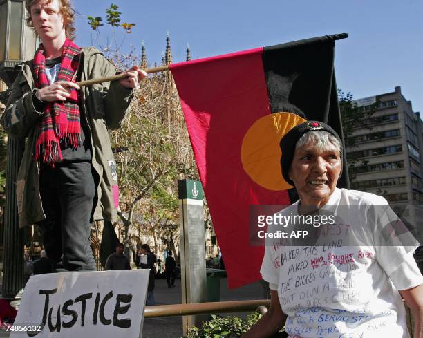 Australian Nick Pelley and Aboriginal Bowie Hickey are protesting for Mulrunji's justice at Sydney's Townhall, 22 June 2007. A Queensland jury...