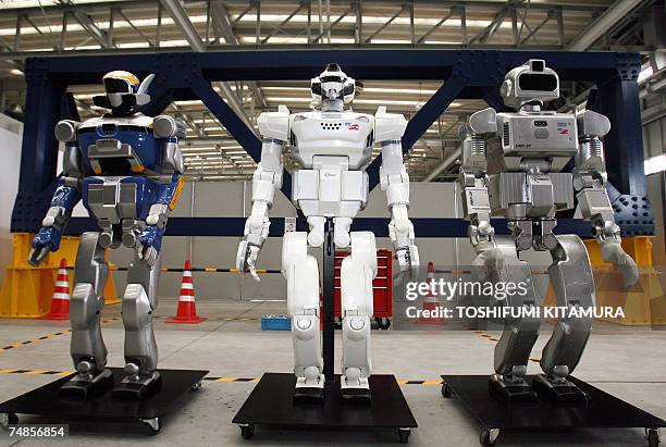Promet Mk-II , HRP-2 Promet and HRP-3 Prototype humanoid robots are diplayed during the Promet Mk-II press preview at Kawada industry's laboratory in...