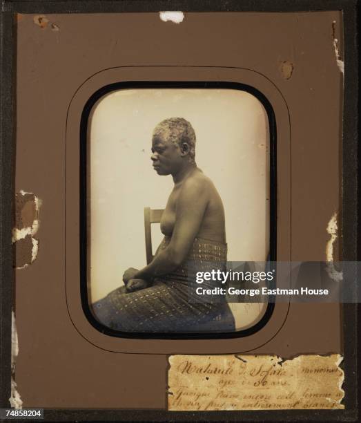 Framed daguerreotype portrait shows the profile of an unidentifed, topless woman from the port town of Sofala , 1845. The caption information...