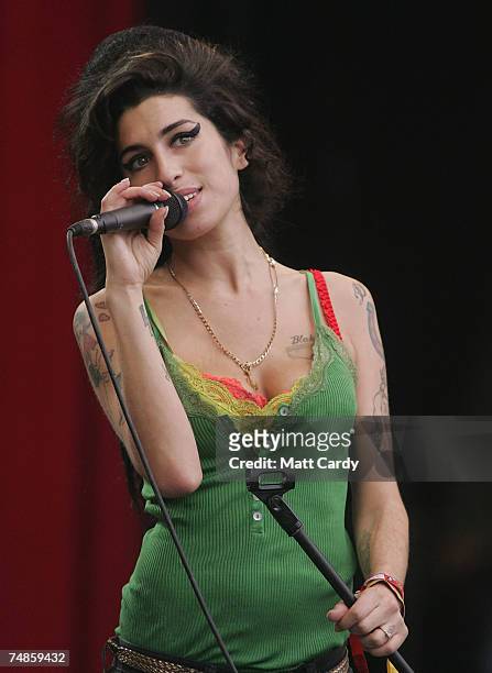Amy Winehouse performs on the Pyramid Stage at Worthy Farm, Pilton near Glastonbury, on June 22 2007 in Somerset, England. The festival, that was...