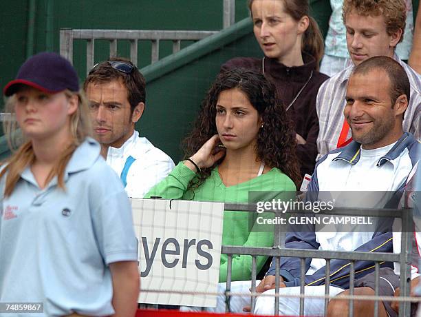 London, UNITED KINGDOM: Francesca 'Xisca' Perello , girlfriend of Spanish tennis player Rafael Nadal, watches him play in an exhibition match against...
