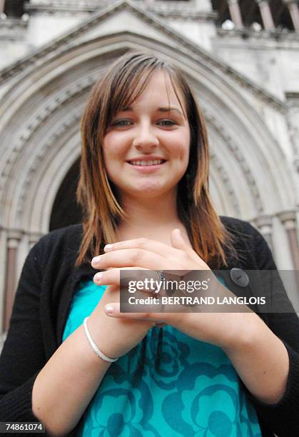 London, UNITED KINGDOM: Lydia Playfoot a British teenager who was banned from wearing a so-called "purity ring" by her school and was appealing the...