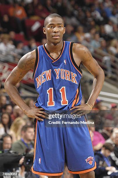 Jamal Crawford of the New York Knicks rests on the court against the Orlando Magic during the game at Amway Arena on February 3, 2007 in Orlando,...