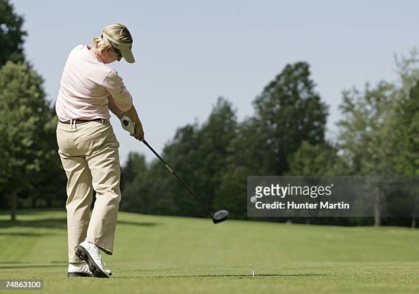 Karrie Webb of Australia hits her tee shot on the 17th hole during the second round of the Wegmans at Locust Hill Country Club June 22, 2007 in...