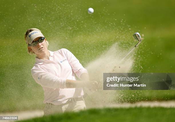 Karrie Webb of Australia hits her third shot on the 13th hole during the second round of the Wegmans at Locust Hill Country Club June 22, 2007 in...