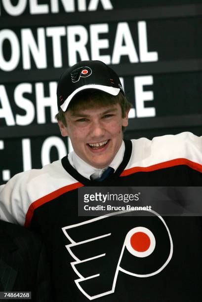 Second overall pick James vanRiemsdyk of the Philadelphia FLyers poses onstage after being drafted in the first round of the 2007 NHL Entry Draft at...