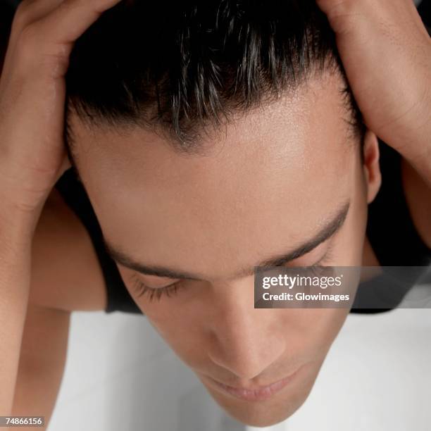 Man Applying Hair Gel Photos and Premium High Res Pictures Getty Images