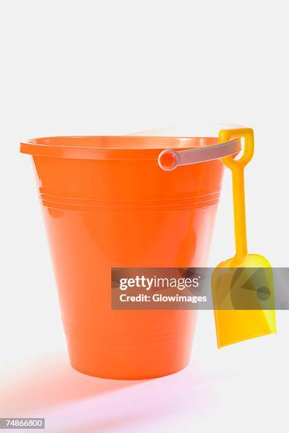 close-up of a sand pail and a shovel - bucket and spade stock pictures, royalty-free photos & images