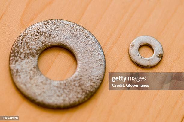 close-up of two washers - washer stock pictures, royalty-free photos & images