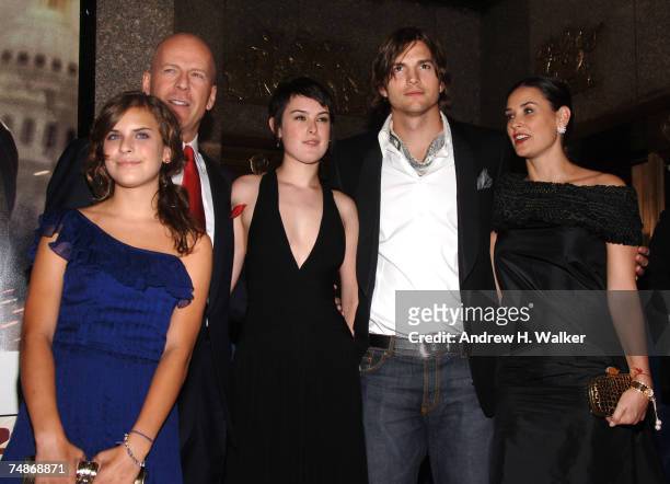 Actors Ashton Kutcher, Demi Moore and Bruce Willis pose with their children Rumer and Tallulah at the premiere of "Live Free Or Die Hard" presented...