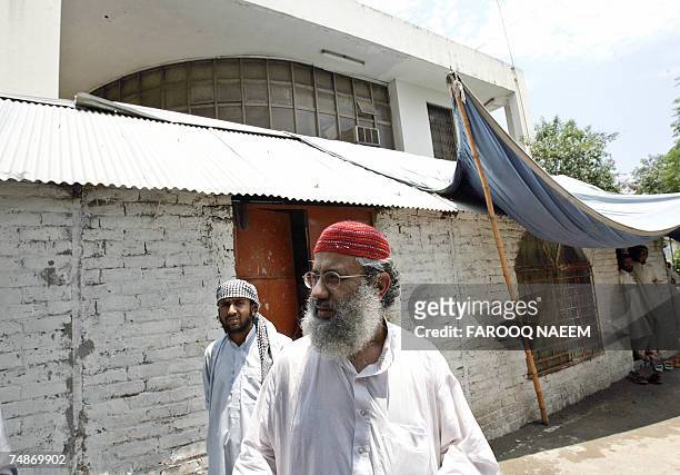 Abdul Rashid Ghazi one of two brothers who head the Red Mosque, stands in front of a room of the Jamia Hafsa seminary where nine people, including...
