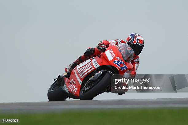 Casey Stoner of Australia and Ducati Marlboro team in actrion during third practice for the Nickel & Dime British Moto GP at Donington Park on June...