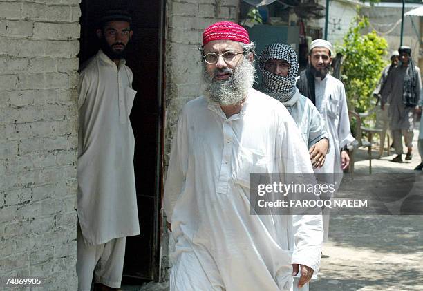 Abdul Rashid Ghazi one of two brothers who head the Red Mosque, stands in front of a room of the Jamia Hafsa seminary where nine people, including...