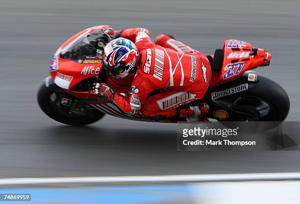 Casey Stoner of Australia and Ducati Marlboro team in actrion during third practice for the Nickel & Dime British Moto GP at Donington Park on June...