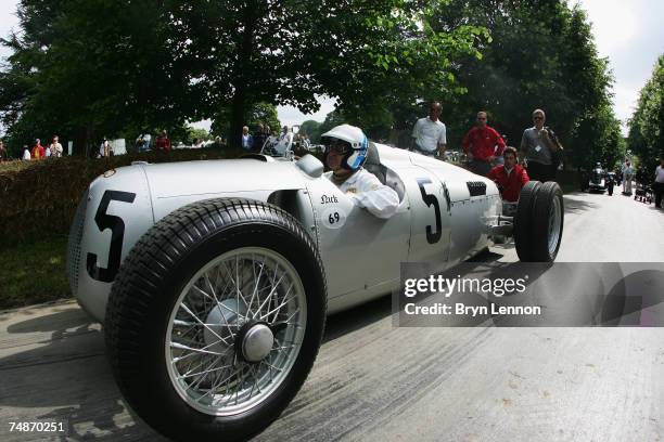 Pink Floyd drummer Nick Mason prepares to drive up the start line of the Goodwood Festival of Speed on June 23, 2007 in Chichester, England.