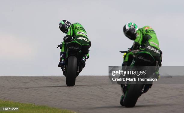Randy De Puniet of France and Anthony West of Australia and the Kawasaki Racing team in action during qualifying for the Nickel & Dime British Moto...