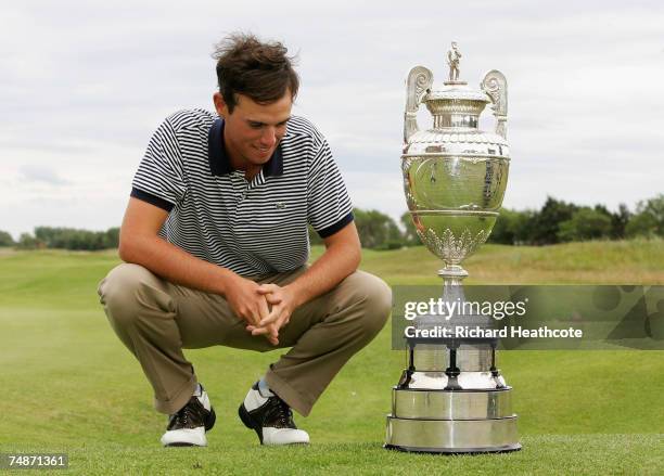 Drew Weaver of the USA looks at all the famous past winners names on the trophy after winning 2&1 during the final of The Amateur Championship 2007...