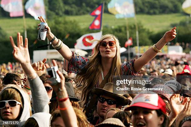 Fans watch Babyshambles perform on the Other Stage on the second day of the Glastonbury Festival at Worthy Farm, Pilton near Glastonbury, on June 23,...