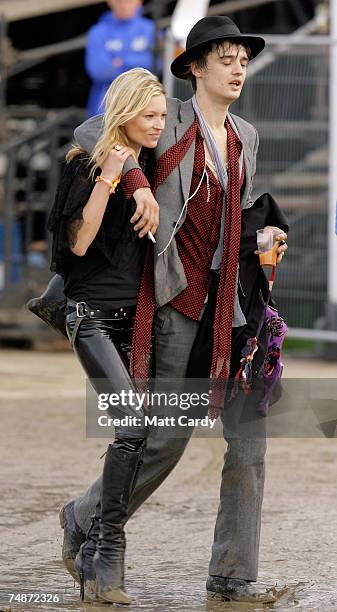 Pete Doherty and Kate Moss walk backstage the Other Stage at Worthy Farm, Pilton near Glastonbury, on June 23 2007 in Somerset, England. The...