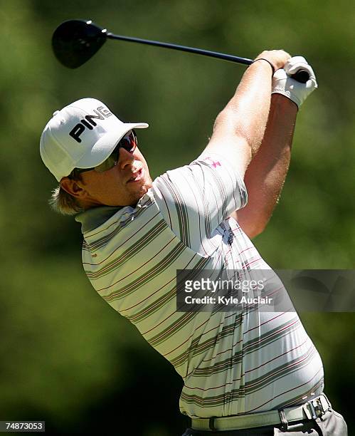Hunter Mahan hits his tee shot on the fourth hole during the third round of the Travelers Championship at the TPC River Highlands June 23, 2007 in...