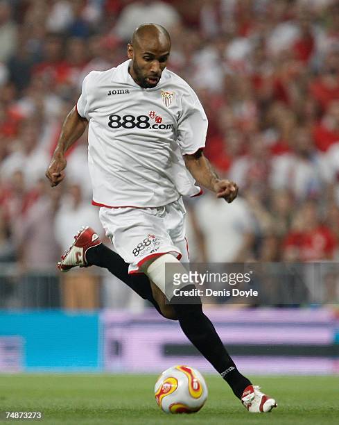 Frederic Kanoute of Sevilla runs forward with the ball during the Copa del Rey final against Getafe at the Santiago Bernabeu stadium on June 23, 2007...
