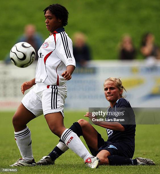 Shireen Teufel of Munich controls the ball away from Ilka Pedersen of Duisburg during the Womens B Juniors final match between FCR 2001 Duisburg and...