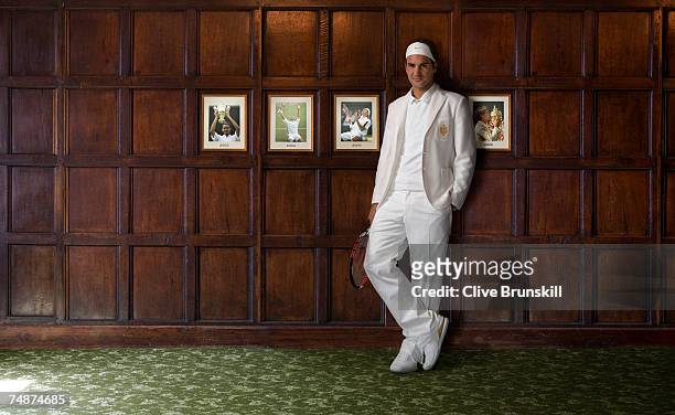 Roger Federer of Switzerland poses for a portrait, wearing the luxury 'heritage' style bespoke kit designed for him by Nike, on June 19, 2007 in...