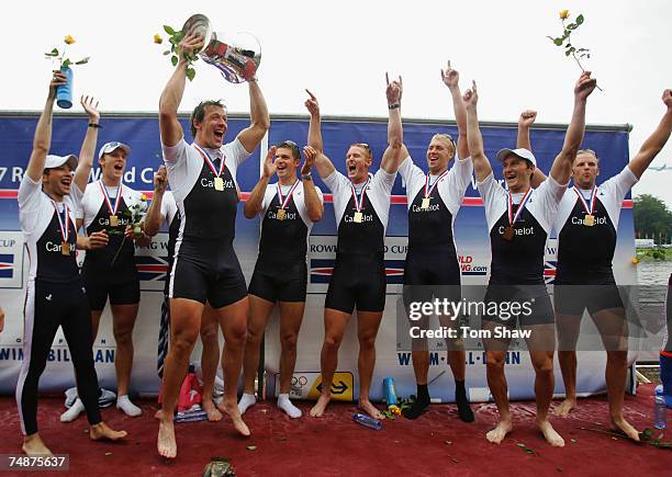 Steve Williams of Great Britain hold the trophy with the rest of the GB2 team after winning the Mens Eight final during day 3 of the FISA Rowing...