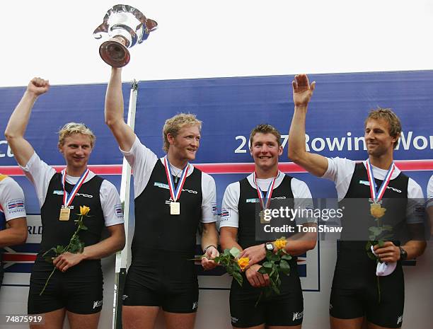 Hamish Bond, Eric Murray, James Dallinger and Carl Meyer of New Zealand celebrate winning the Mens Four Final A during day 3 of the FISA Rowing World...