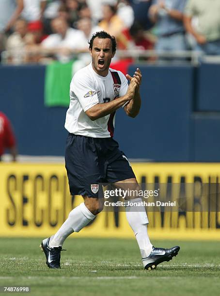 Landon Donovan of the USA celebrates after he scored a goal to tie the match 1-1 against Mexico during the CONCACAF Gold Cup Final match at Soldier...