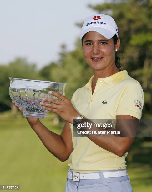 Lorena Ochoa of Mexico poses with the trophy after winning at the Wegmans LPGA tournament at Locust Hill Country Club on June 24, 2007 in Pittsford,...