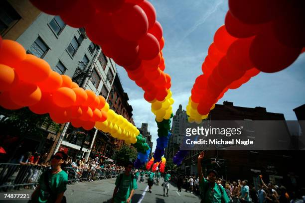Participants march with rainbow balloons in the Gay Pride Parade June 24, 2007 in New York City. The parade celebrates lesbian, gay, bisexual and...