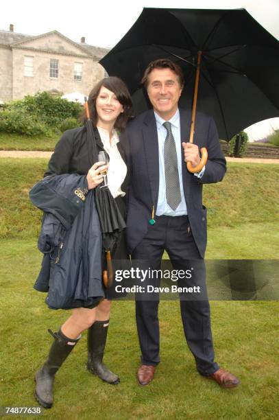 Katie Turner and Bryan Ferry attend the Cartier ''Style and Luxe'' lunch at the Goodwood Festival of Speed on the Earl of March's private lawn on...