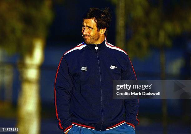 Former Rugby League player Andrew Johns looks on during an Australian Wallabies training session at Xavier College on June 25, 2007 in Melbourne,...