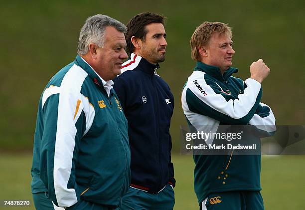 John Connolly coach of the Wallabies, former Rugby League player Andrew Johns and Wallabies team manager Chris Webb look on during an Australian...