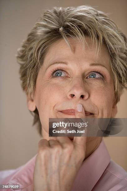 Model Looking Off Camera 39 Mature Woman Looking Off Camera Stock Photos, High-Res Pictures, and ...