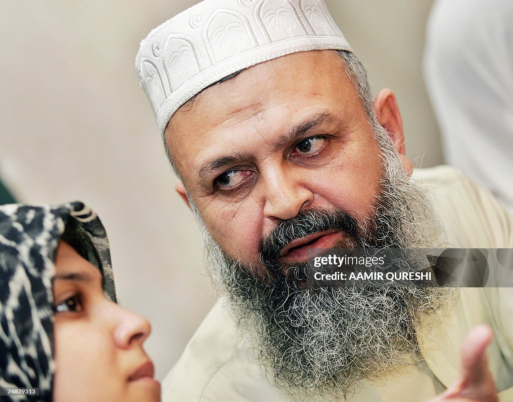 Pakistani Khalid Khawaja (R) Chief Coord...