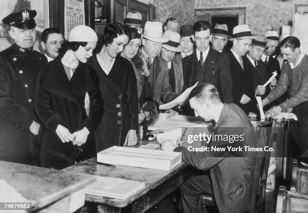 Voters cast their ballots on the repeal of prohibition in a polling station near City Hall, New Jersey, 16th May 1933.