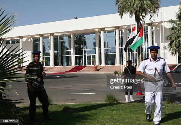 Egyptian security stand outside the congress center where Israeli Prime Minister Ehud Olmert, Egyptian President Hosni Mubarak, Palestinian leader...