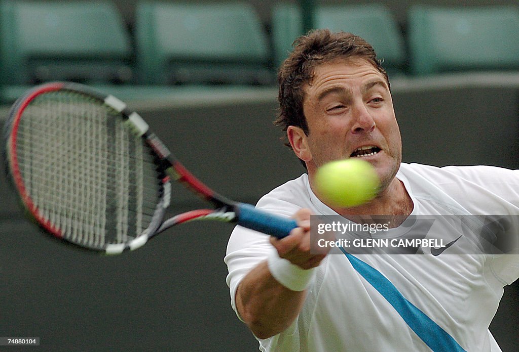 US Justin Gimelstob returns the ball to...