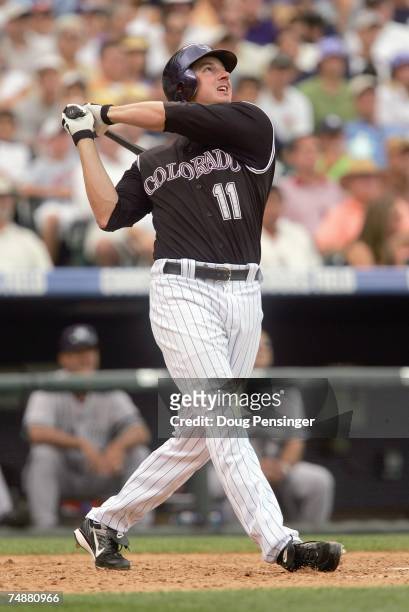 Brad Hawpe of the Colorado Rockies makes a hit during the game against the New York Yankees at Coors Field on June 21, 2007 in Denver, Colorado....