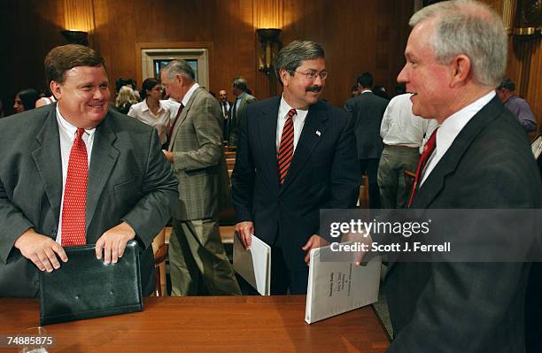 Sen. Jeff Sessions, R-Ala., right, talks with Douglas Huntt, a member of the Commission on Excellence in Special Education, and the Commission's...