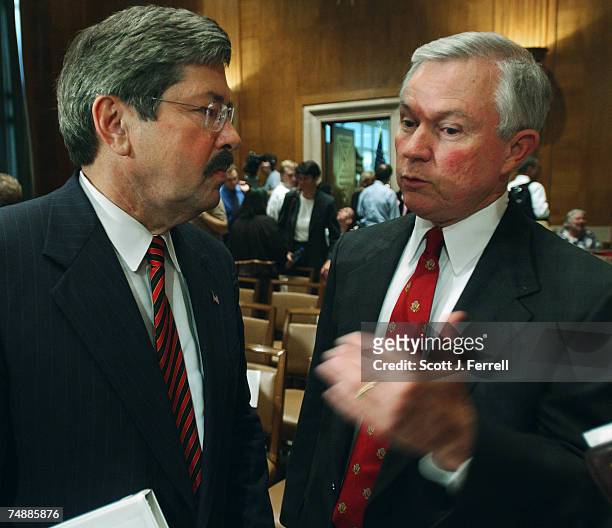 Sen. Jeff Sessions, R-Ala., right, talks with Commission on Excellence in Special Education Chairman Terry Branstad after the Senate Health,...