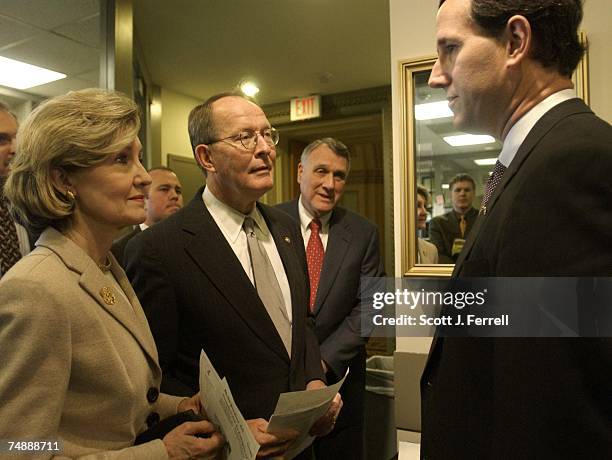 Senate GOP Conference Chairman Rick Santorum, R-Pa., far right, GOP Conference Secretary Kay Bailey Hutchison, R-Texas, far left, Sen. Lamar...