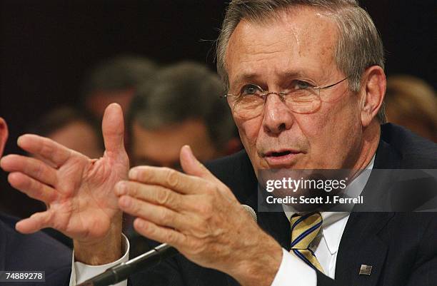 Defense Secretary Donald H. Rumsfeld responds to questions by Sen. Edward M. Kennedy, D-Mass., on nuclear posture review during the Senate Armed...