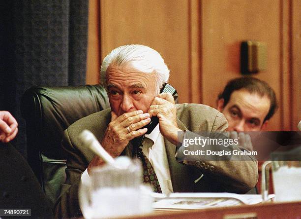 Chairman Benjamin A. Gilman, R-N.Y., makes a phone call before the start of the hearing on the Balkans Policy.